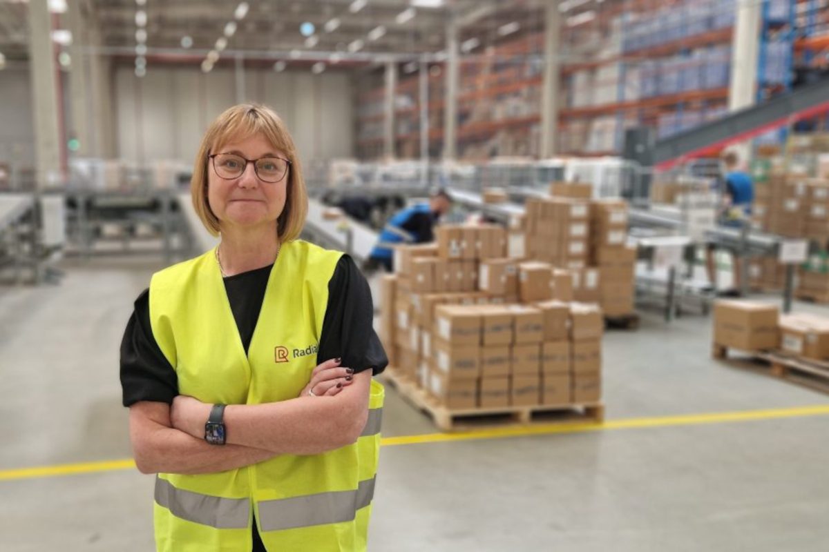 A photograph of Sarah Harvey in the warehouse