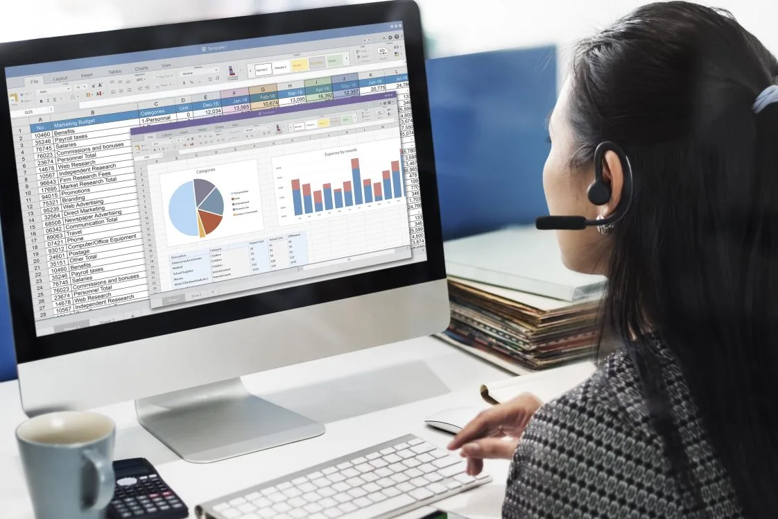 woman on computer looking at analytics