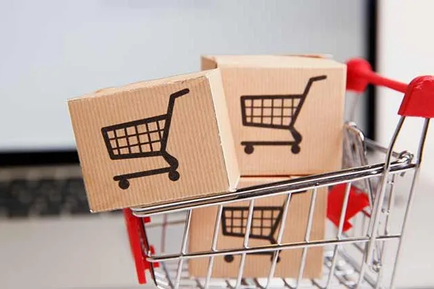 shopping cart filled with boxes