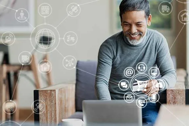 man shopping on computer with credit card